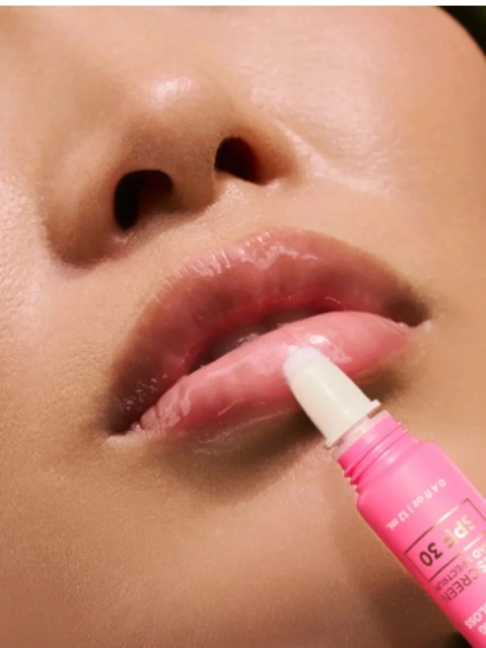 LALICIOUS Hydrating Butter Gloss SPF 30 in Berry Bomb shine shield plump hydrate